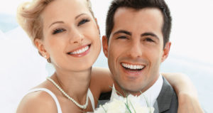 Newly married couple smiling happily together, showing joy and love