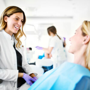 dentist talking to patient